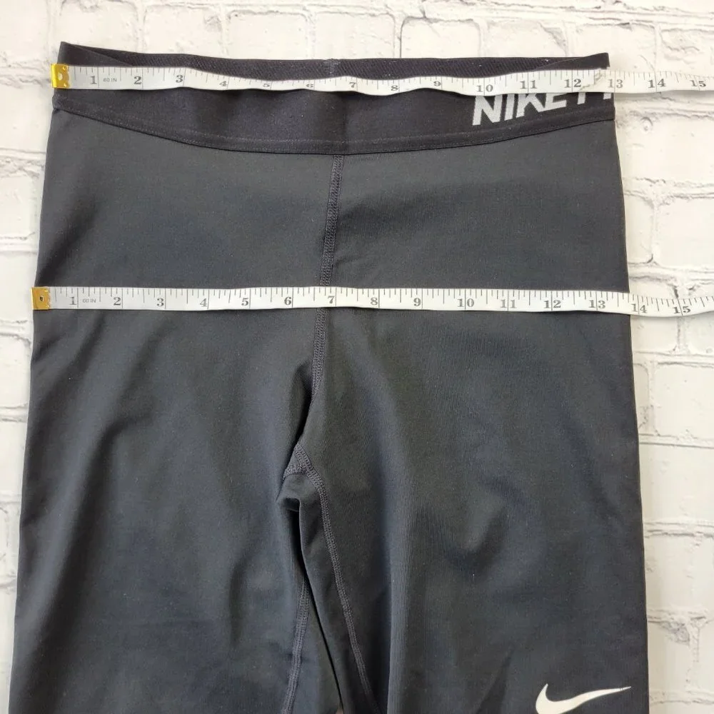 ✅ Nike Dri-FIT Women Black solid Print Training Capris Leggings Size M